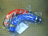 red and blue intake tubes, packaged for shipping